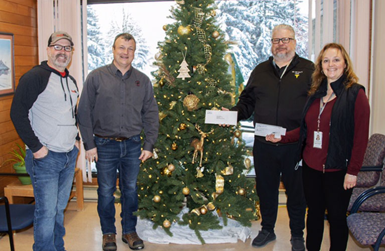 $10,000 donation on behalf of the Paterson Family foundation to Tri Lake Health Centre in Killarney. From Left to right, Trevor Murdy (GM, FeedMax), Shayne Skeoch (GM, Paterson Grain Pierson), Shawn Lockhart (Care team Manager), Tammy Riddle (Finance).