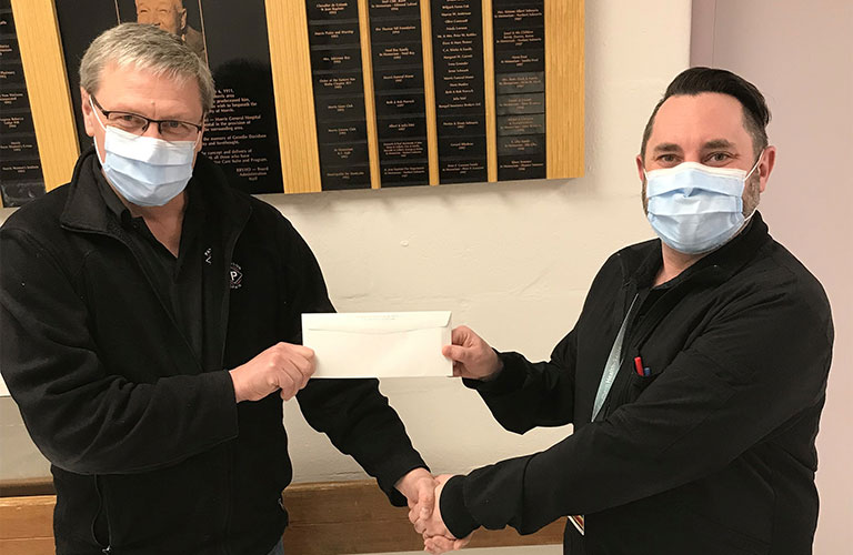 A $10,000 donation on behalf of the Paterson Family Foundation to Morris General Hospital with a donation from the Paterson Foundation to the Morris General Hospital. Pictured: Alvin Martens (Marketing Manager, Paterson Grain Morris) presenting the cheque to Matthew Morris (Facility Manager)